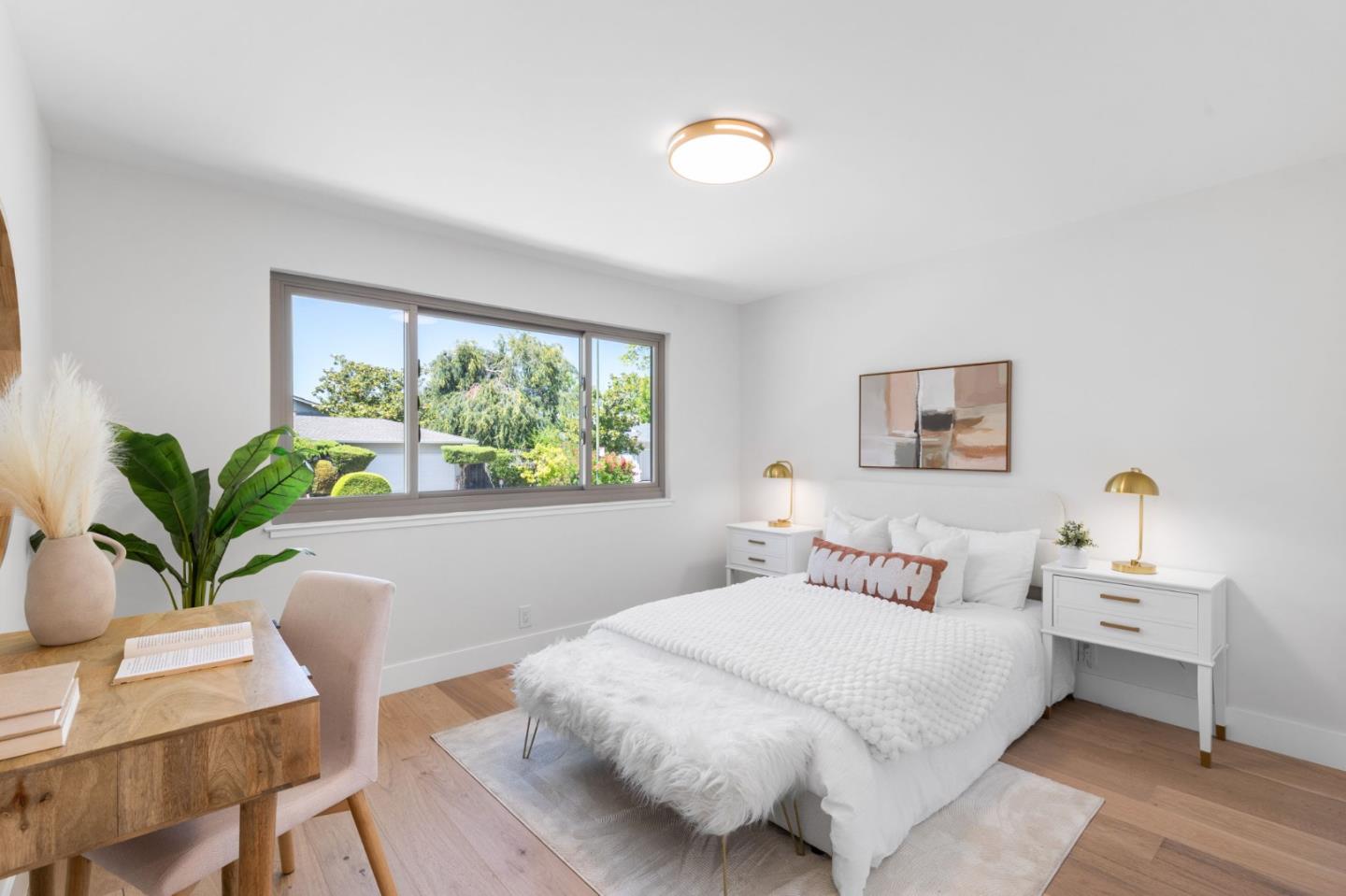 1961 Fordham Way Mountain View, CA 94040 - Photo 25 of 29 a bedroom with a bed and a table