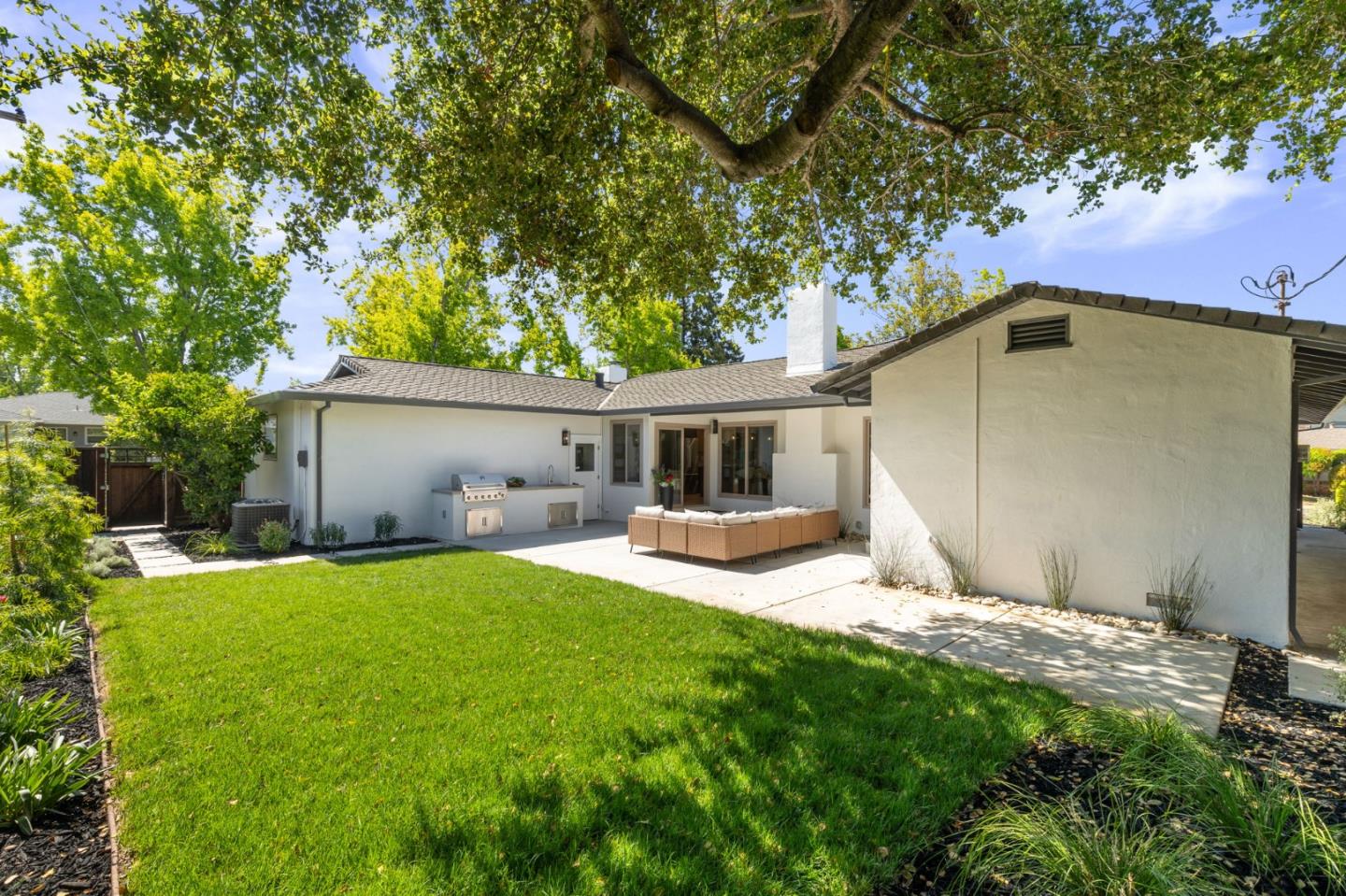 1961 Fordham Way Mountain View, CA 94040 - Photo 28 of 29 a front view of house with yard and green space