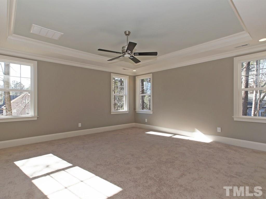 6415 Rosny Road Raleigh, NC 27613 - Photo 14 of 25 a view of an empty room with a window