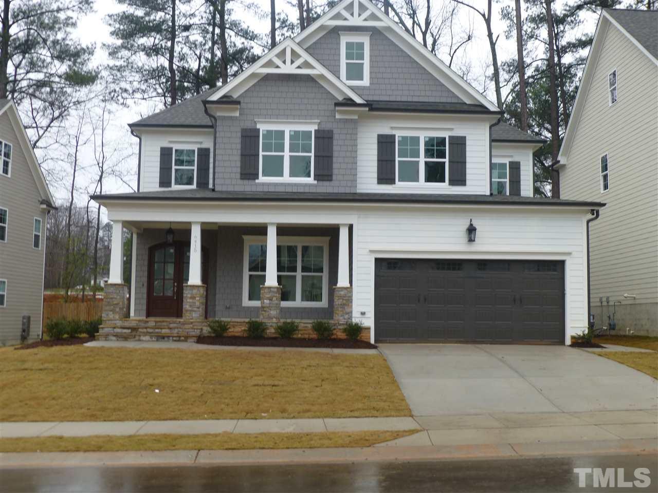 6415 Rosny Road Raleigh, NC 27613 - Photo 2 of 25 a front view of a house with yard
