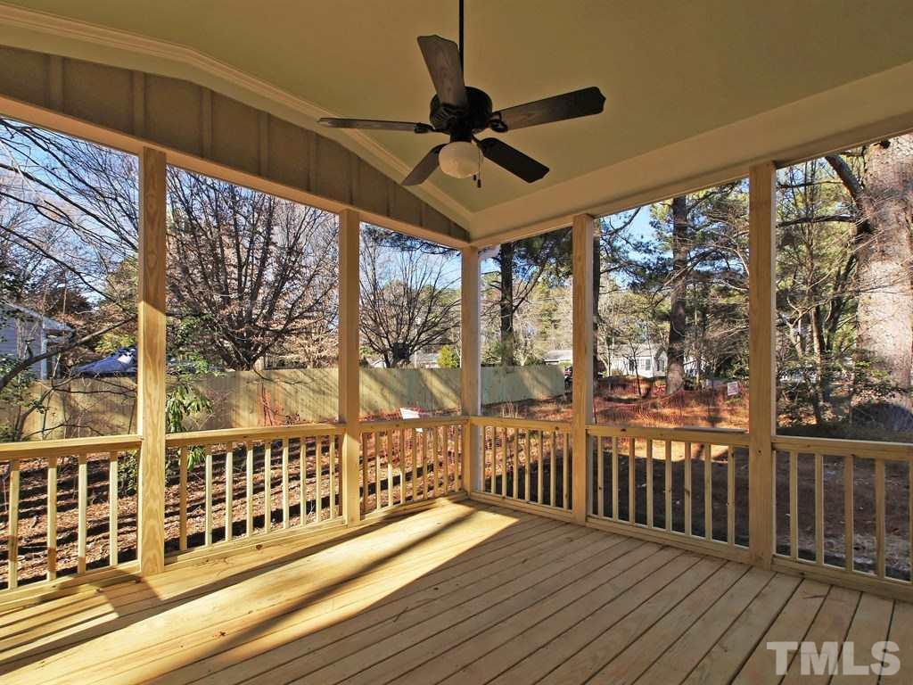 6415 Rosny Road Raleigh, NC 27613 - Photo 24 of 25 a view of a balcony with wooden floor