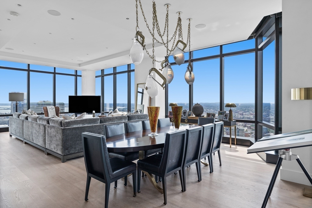 1 Franklin Street, Unit PH3E Boston, MA 02110 - Photo 14 of 42 a view of a dining room with furniture
