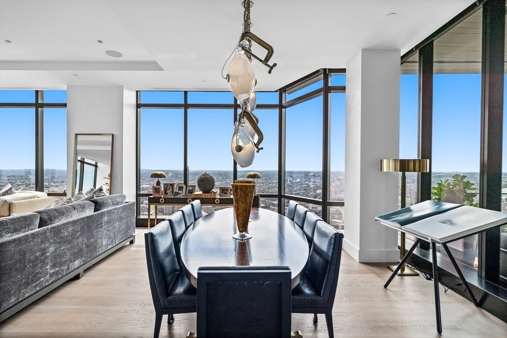 1 Franklin Street, Unit PH3E Boston, MA 02110 - Photo 15 of 42 a view of a dining room with furniture