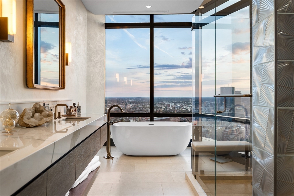 1 Franklin Street, Unit PH3E Boston, MA 02110 - Photo 30 of 42 a kitchen with a sink and a refrigerator