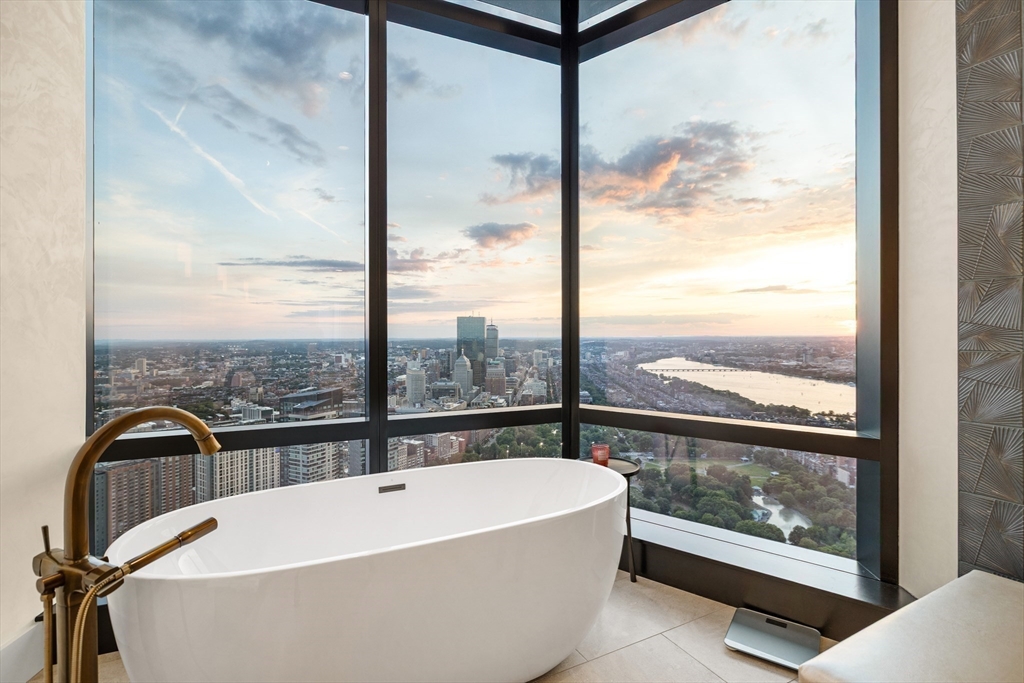1 Franklin Street, Unit PH3E Boston, MA 02110 - Photo 31 of 42 a view of a bathroom with a bathtub