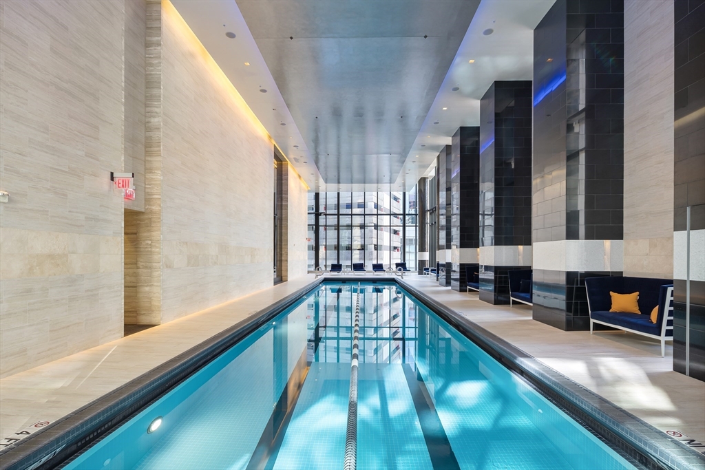 1 Franklin Street, Unit PH3E Boston, MA 02110 - Photo 40 of 42 a view of swimming pool with a porch and furniture