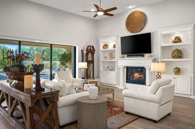 a kitchen with kitchen island granite countertop a sink counter and stainless steel appliances