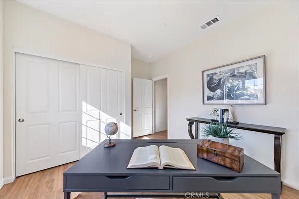 a workspace with furniture and window