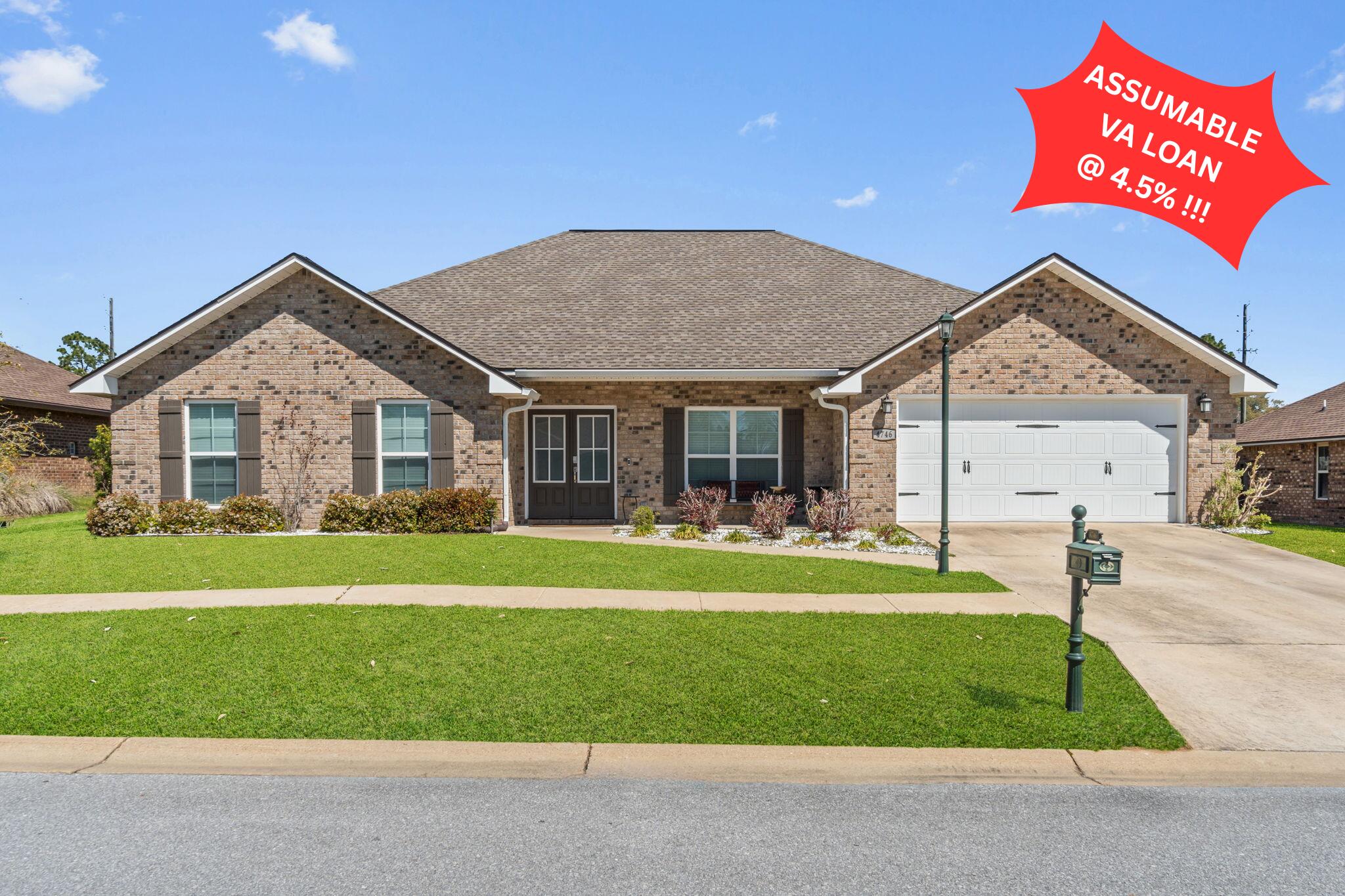 4746 Chanson Crossing Crestview, FL 32539 - Photo 21 of 21 a front view of a house with a yard and porch