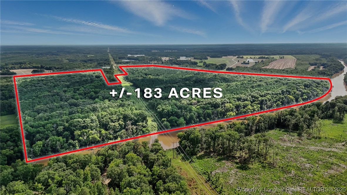 5725 River Road Wade, NC 28395 - Photo 3 of 35 a view of a sign in front of a house