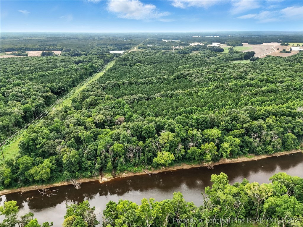 5725 River Road Wade, NC 28395 - Photo 35 of 35 an aerial view of residential houses with outdoor space and swimming pool