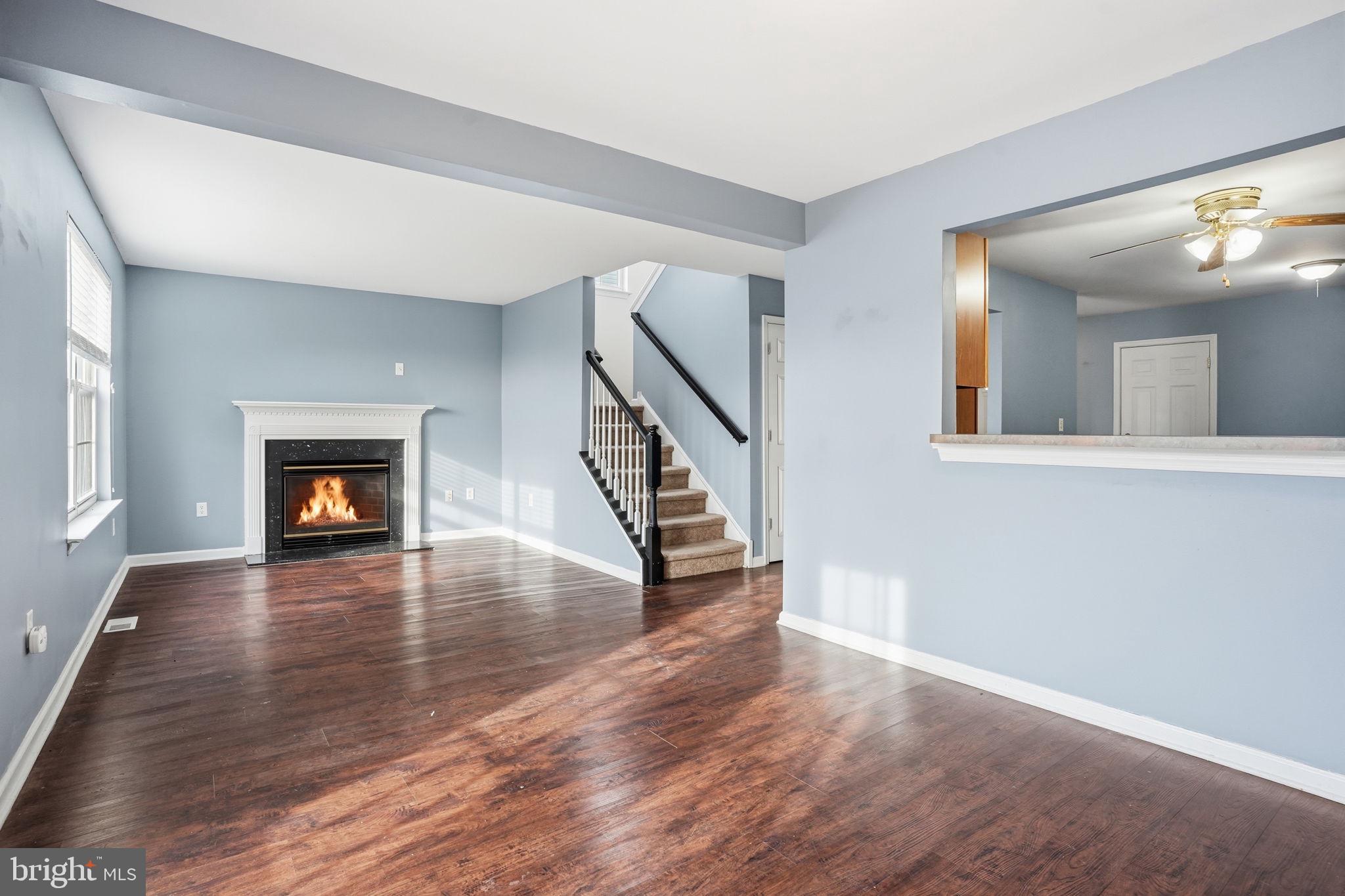 737 Seminary Street Pennsburg, PA 18073 - Photo 11 of 30 a view of an empty room with wooden floor and a window