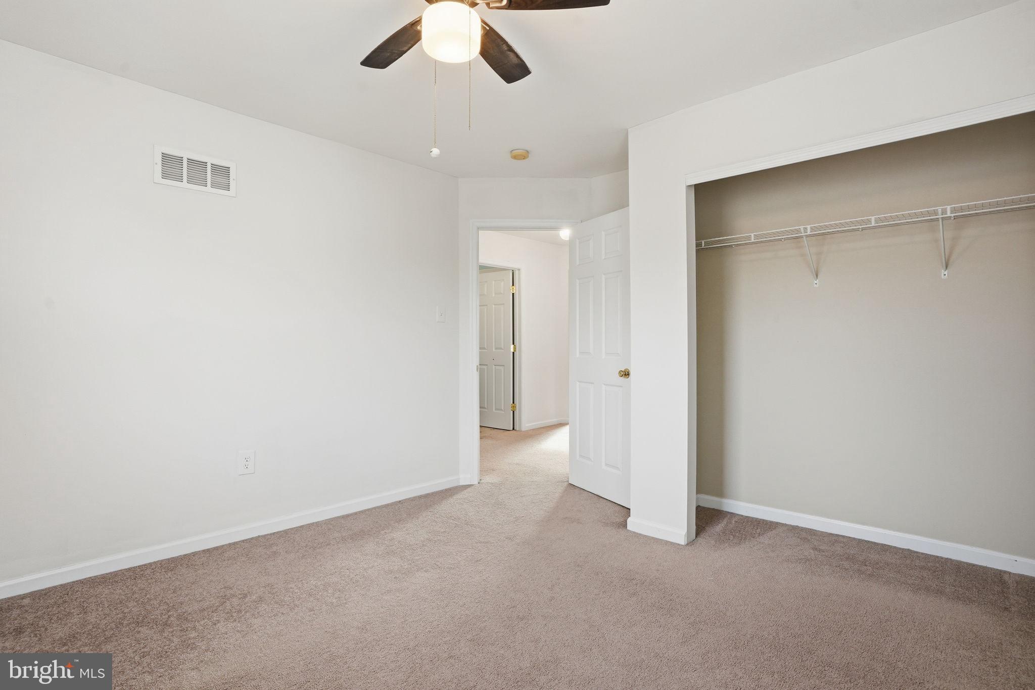 737 Seminary Street Pennsburg, PA 18073 - Photo 18 of 30 an empty room with chandelier fan