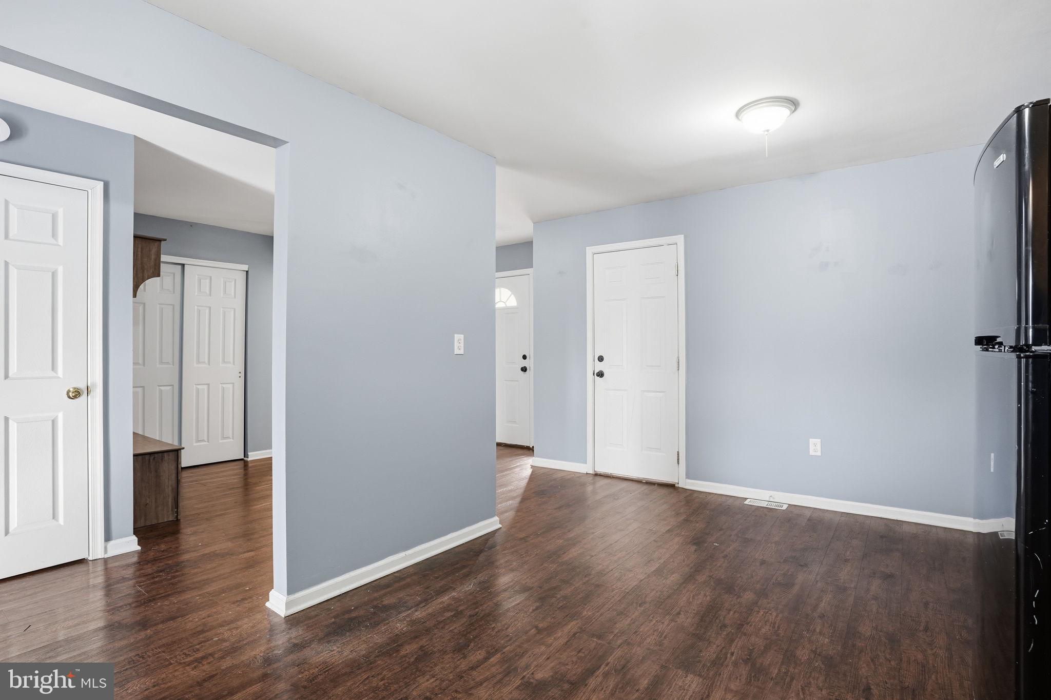 737 Seminary Street Pennsburg, PA 18073 - Photo 3 of 30 wooden floor in an empty room with a window