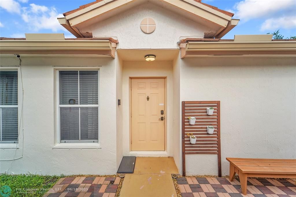 7542 Northwest 3rd Street Plantation, FL 33317 - Photo 3 of 31 a view of front door of house