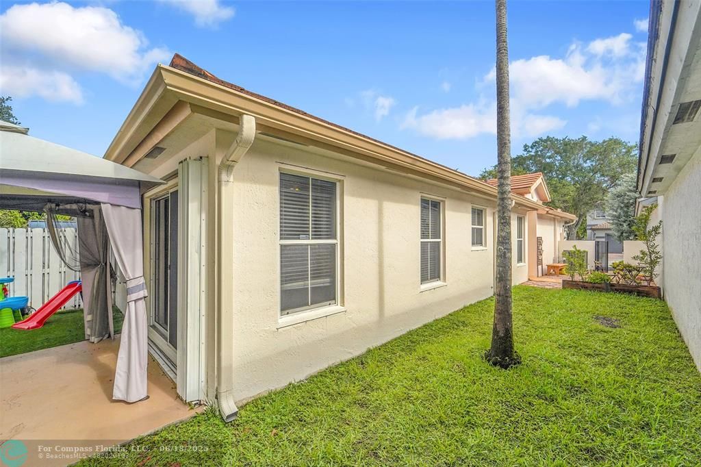 7542 Northwest 3rd Street Plantation, FL 33317 - Photo 31 of 31 a view of a house with a yard