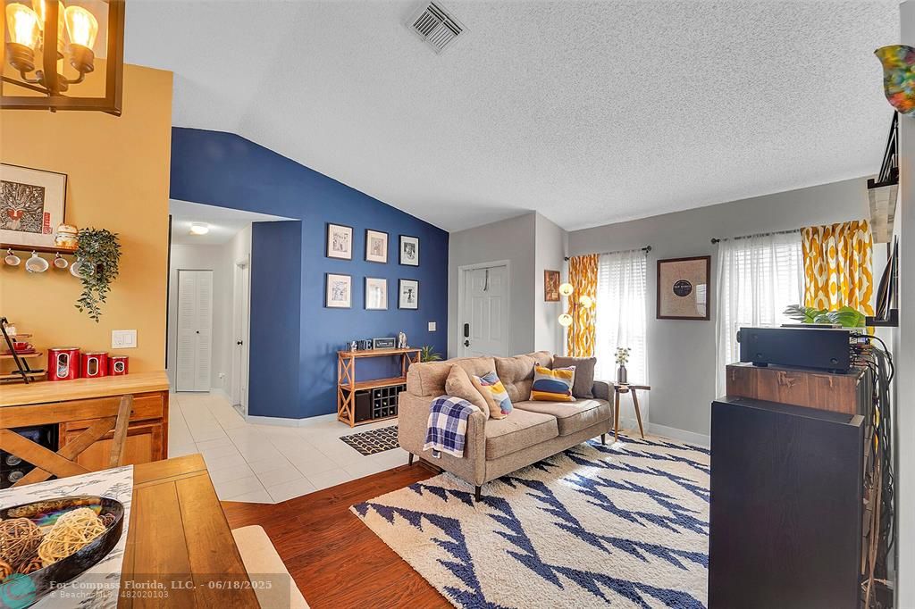7542 Northwest 3rd Street Plantation, FL 33317 - Photo 8 of 31 a living room with furniture and a window