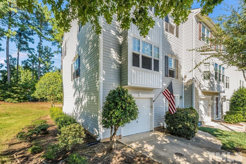 5145 Sandy Banks Road Raleigh, NC 27616 - Photo 2 of 30 a view of a garden with pathway