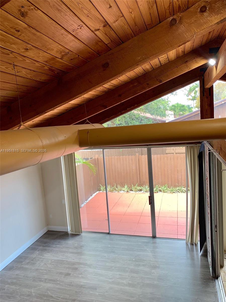 11318 Southwest 114th Cir Terrace Miami, FL 33176 - Photo 21 of 30 a view of an empty room with a fireplace