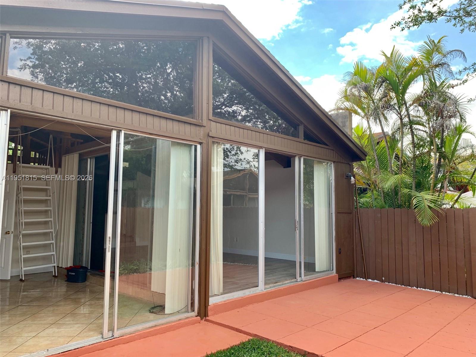 11318 Southwest 114th Cir Terrace Miami, FL 33176 - Photo 26 of 30 a backyard of a house