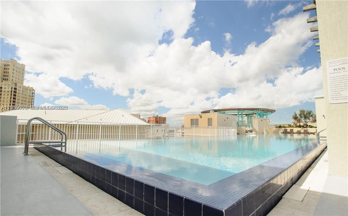 7275 Southwest 90th Street, Unit C312 Miami, FL 33156 - Photo 6 of 9 an aerial view of a house