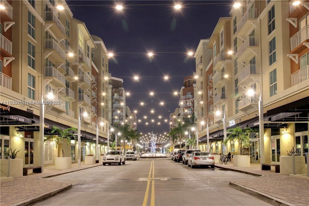 7275 Southwest 90th Street, Unit C312 Miami, FL 33156 - Photo 8 of 9 a view of a building with a street