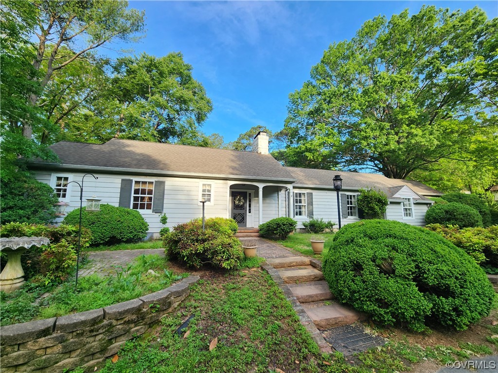 front view of a house and a yard