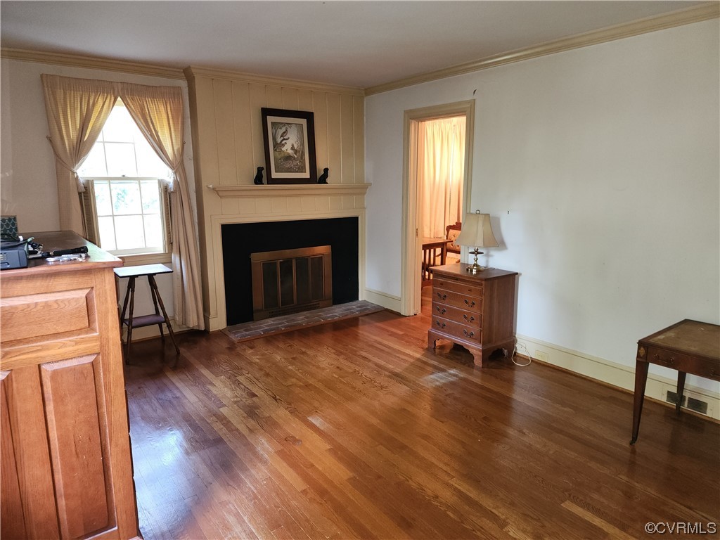 185 Washington Street Boydton, VA 23917 - Photo 11 of 45 a living room with furniture and a fireplace