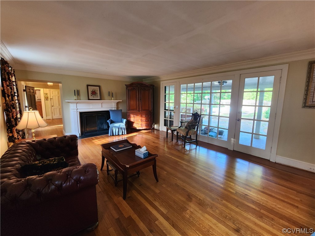 185 Washington Street Boydton, VA 23917 - Photo 12 of 45 a living room with furniture and a fireplace