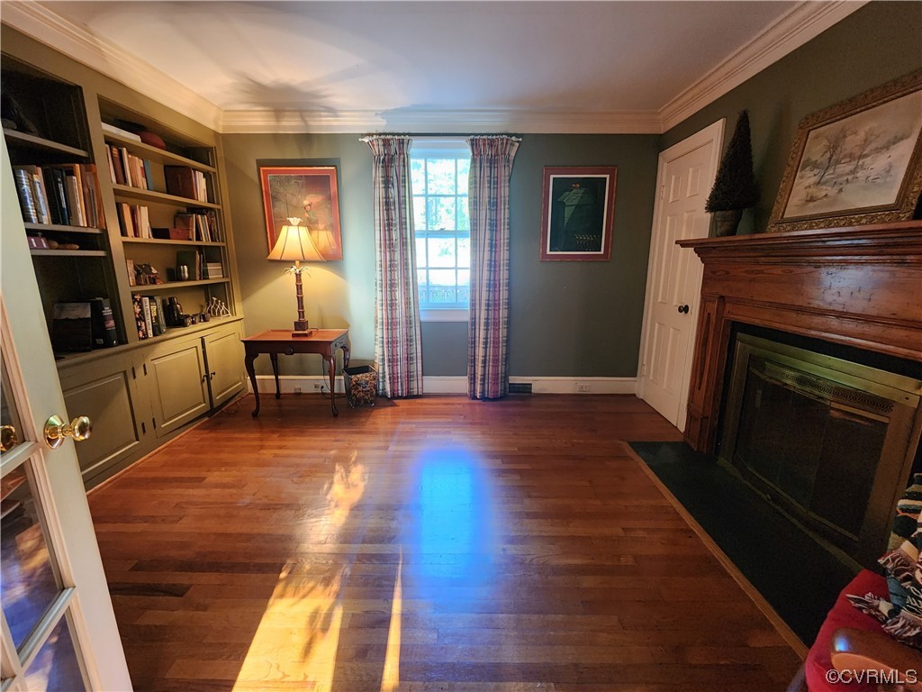 185 Washington Street Boydton, VA 23917 - Photo 13 of 45 a living room with furniture and a fireplace