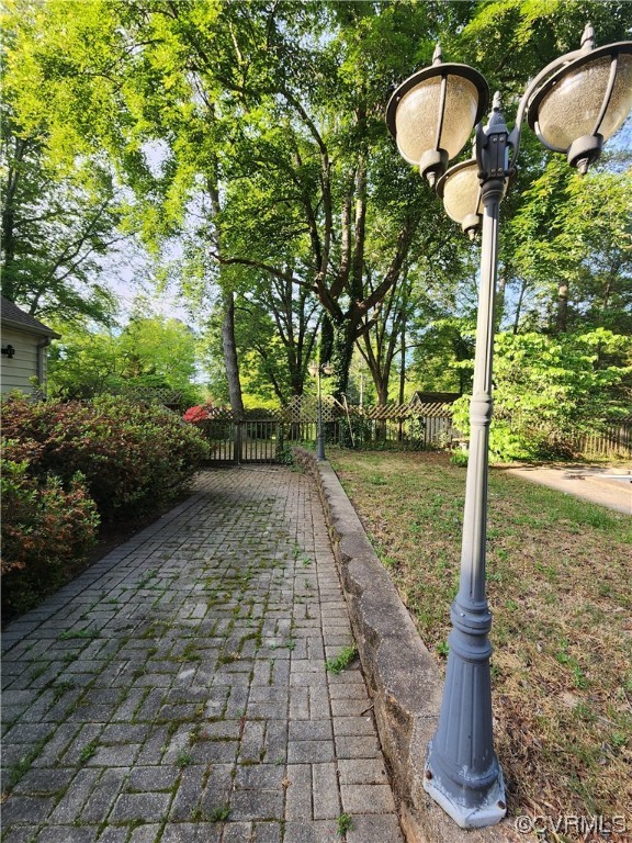 185 Washington Street Boydton, VA 23917 - Photo 39 of 45 a street sign on a sidewalk next to a yard