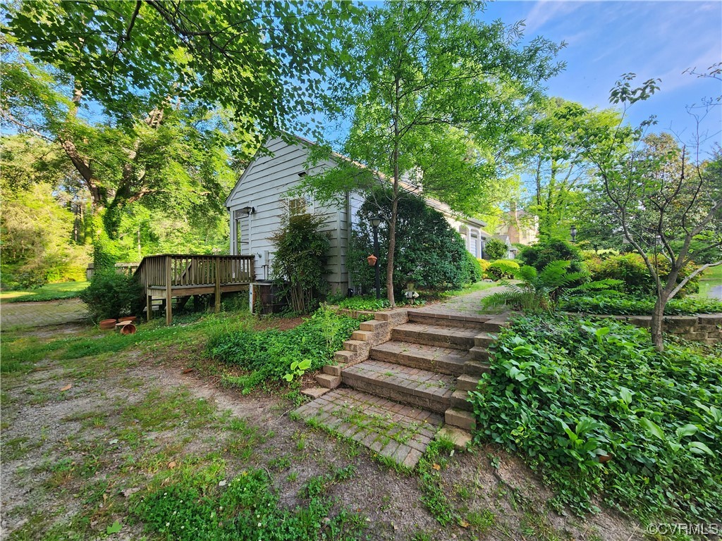 185 Washington Street Boydton, VA 23917 - Photo 5 of 45 a view of a garden with large trees