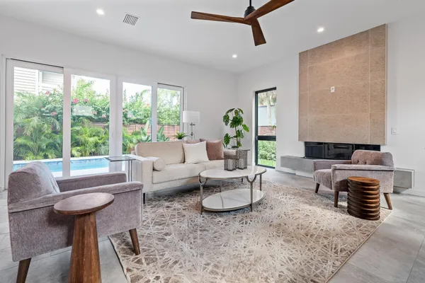 a kitchen with a table and chairs in it