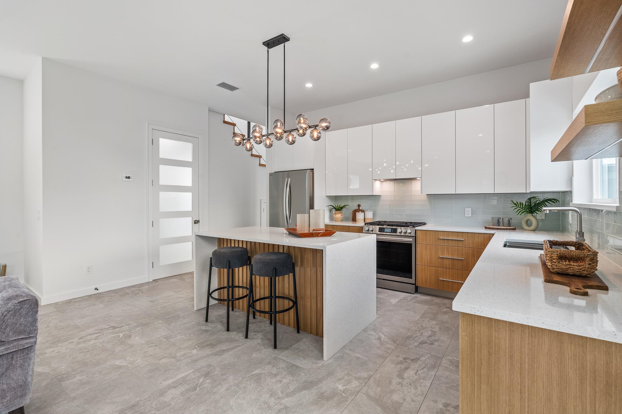 327 Minorca Avenue St. Augustine, FL 32080 - Photo 19 of 74 a kitchen with a table and chairs in it