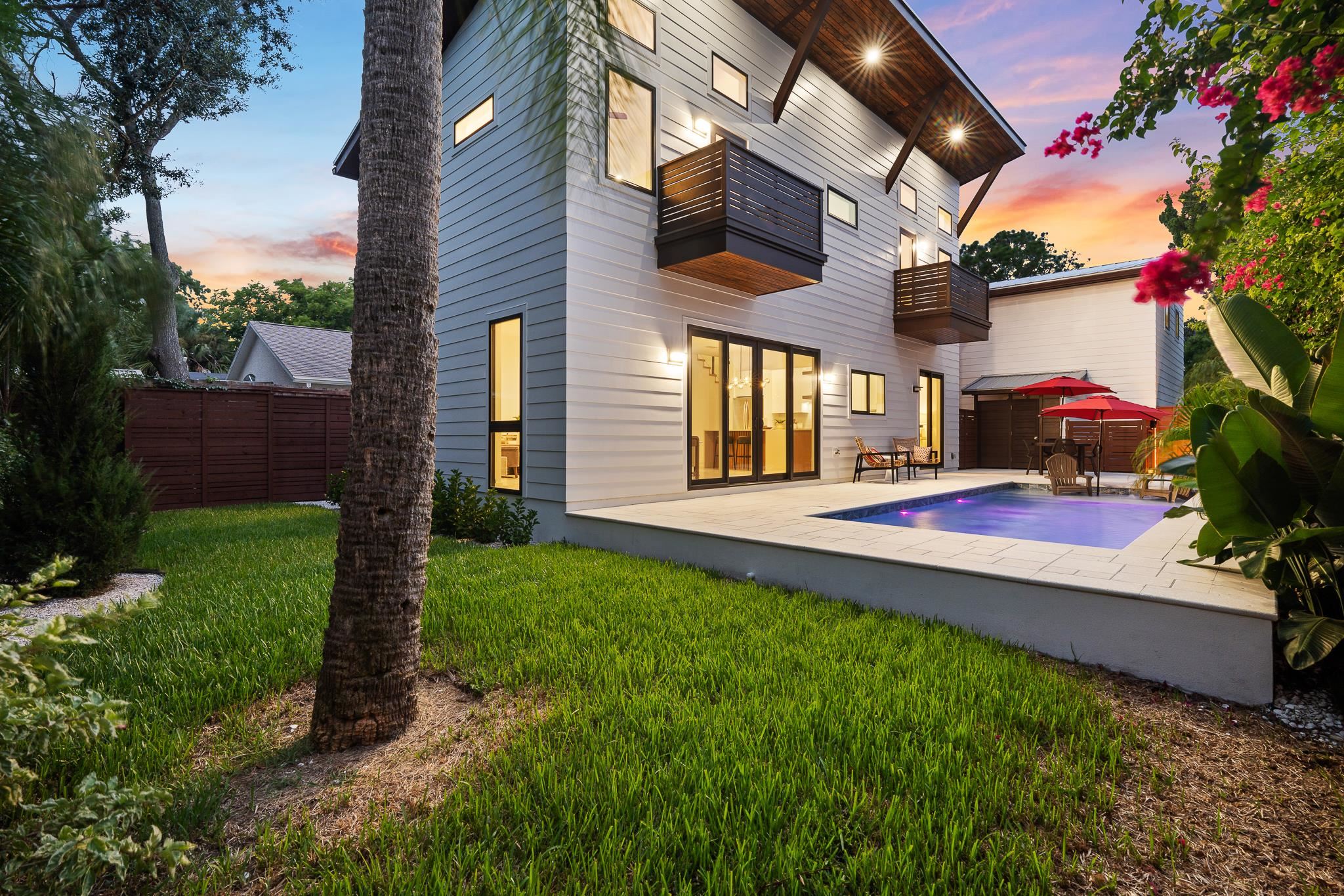 327 Minorca Avenue St. Augustine, FL 32080 - Photo 2 of 74 a view of a house with backyard and a tree