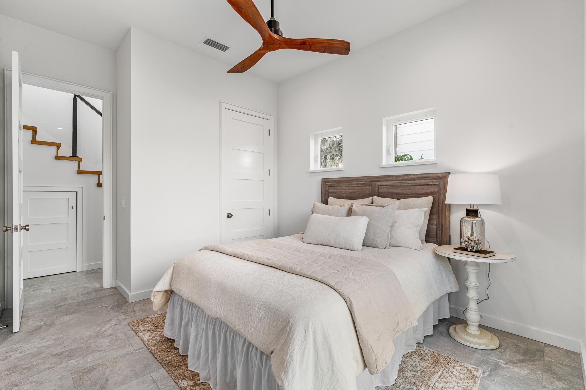 327 Minorca Avenue St. Augustine, FL 32080 - Photo 23 of 74 a bedroom with a bed and a window