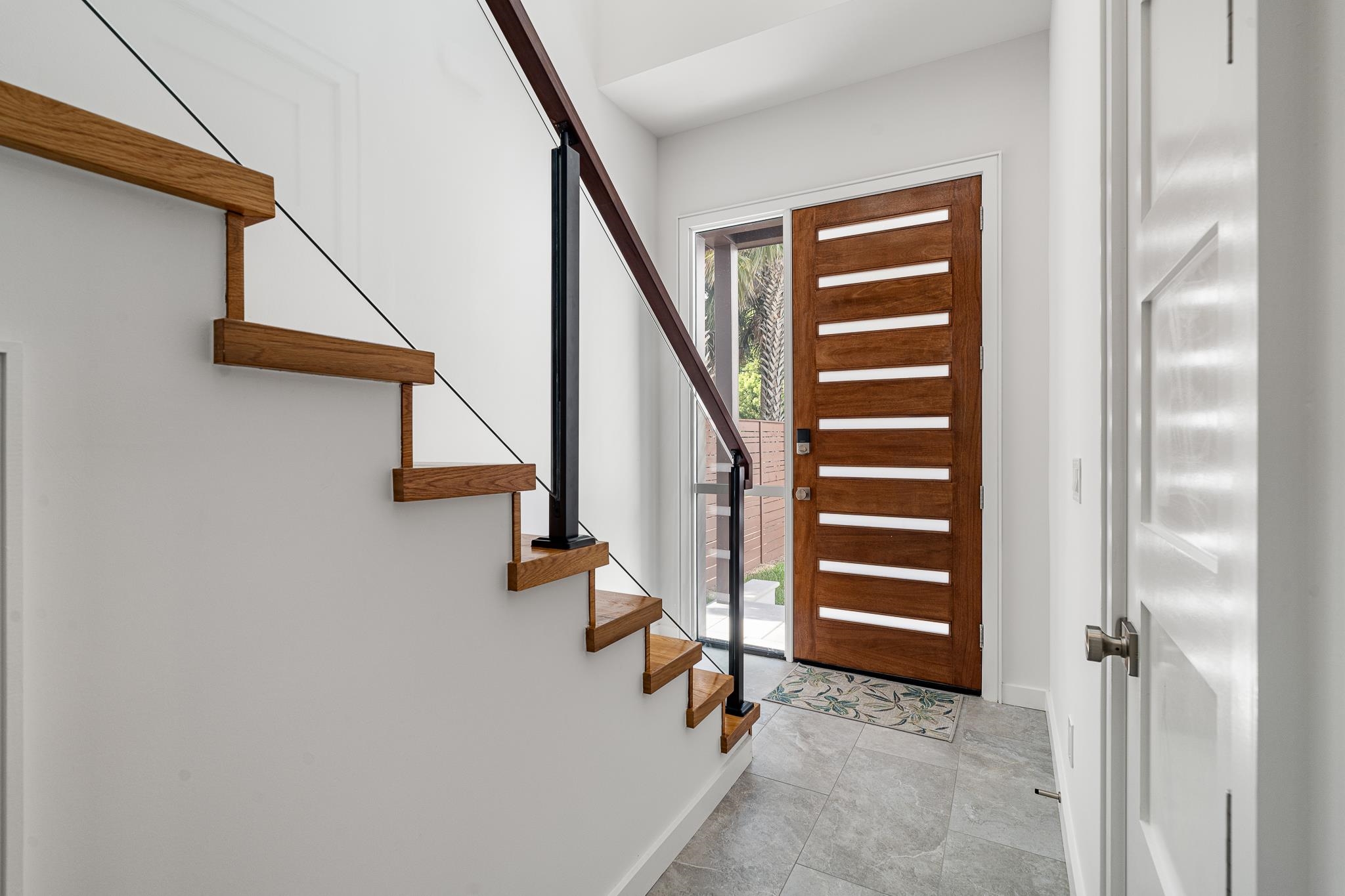 327 Minorca Avenue St. Augustine, FL 32080 - Photo 24 of 74 a view of staircase with wooden floor and stairs
