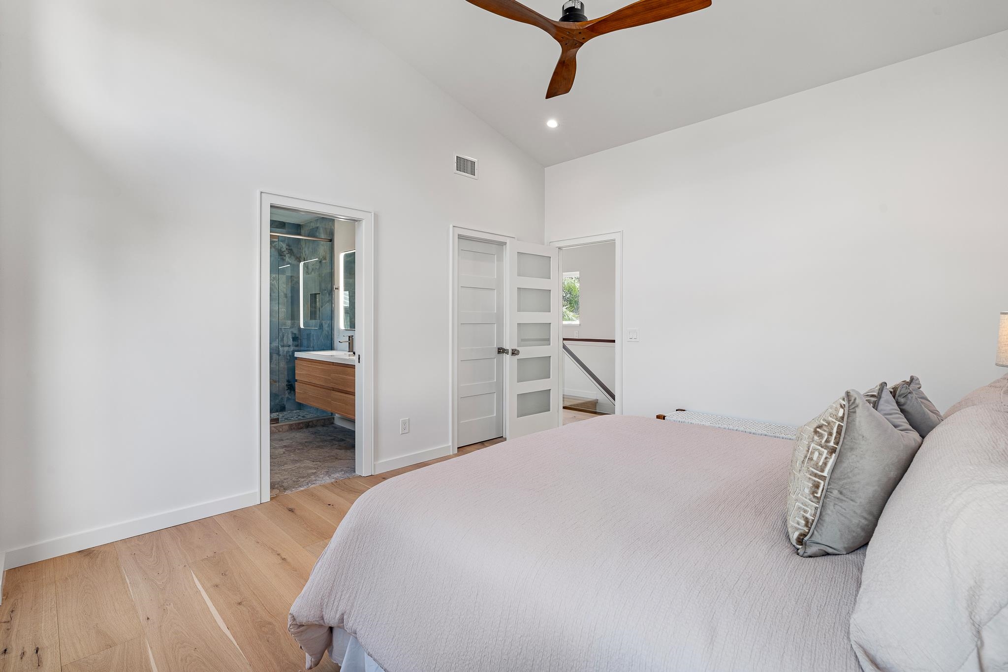 327 Minorca Avenue St. Augustine, FL 32080 - Photo 35 of 74 a bedroom with a bed and a table