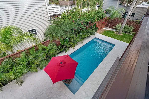 a bedroom with a bed and a table
