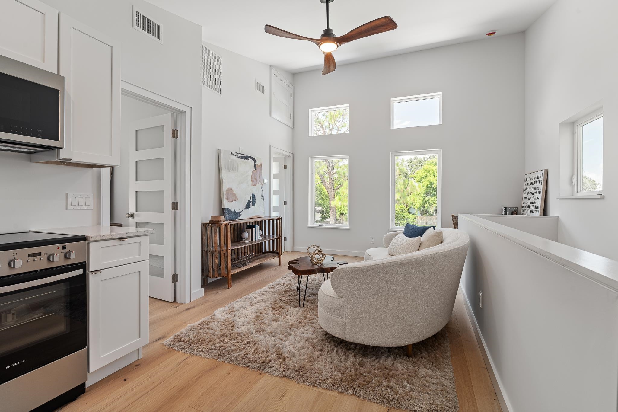 327 Minorca Avenue St. Augustine, FL 32080 - Photo 54 of 74 a living room with furniture and a flat screen tv
