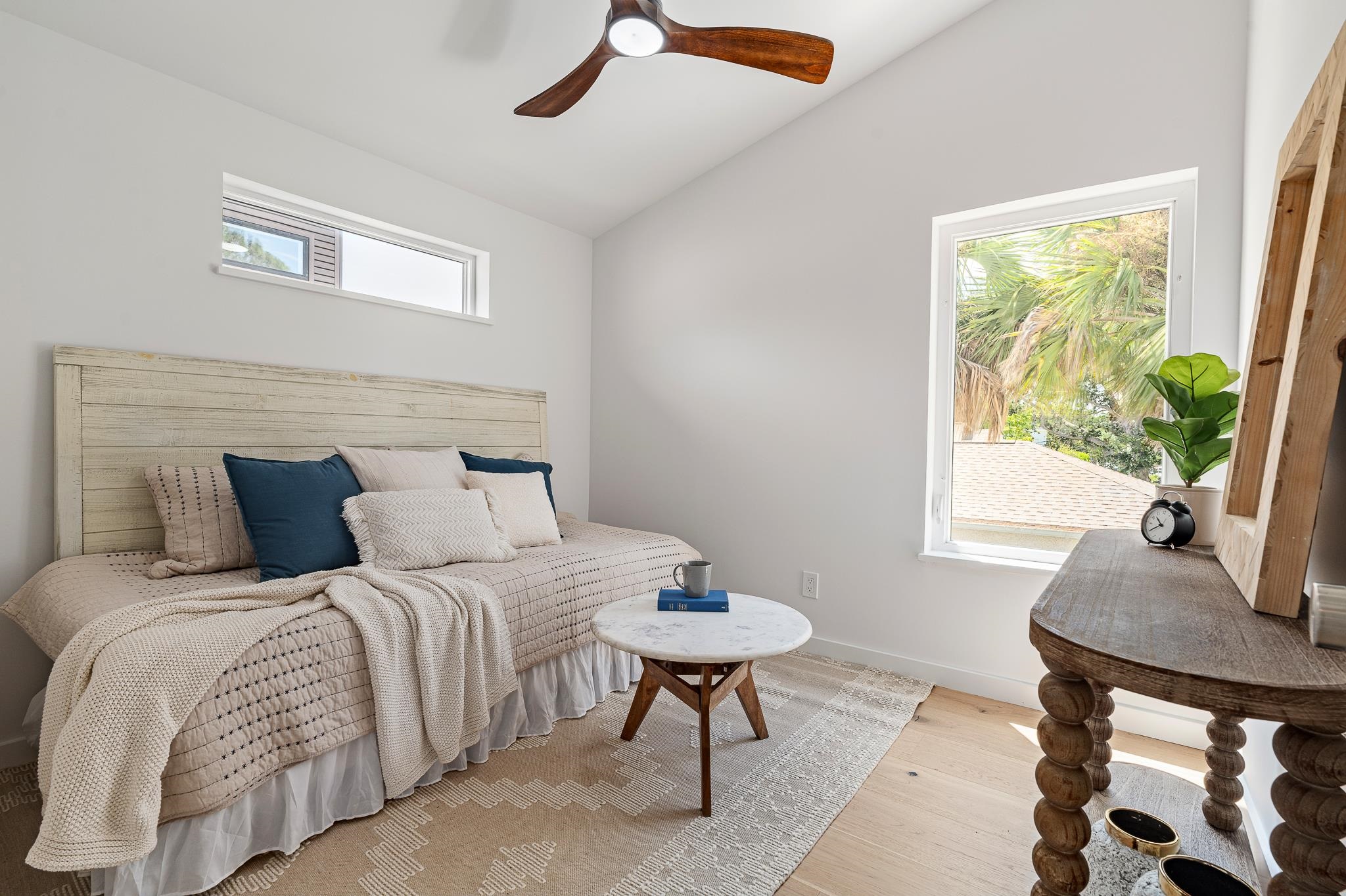 327 Minorca Avenue St. Augustine, FL 32080 - Photo 59 of 74 a bedroom with a bed and a table