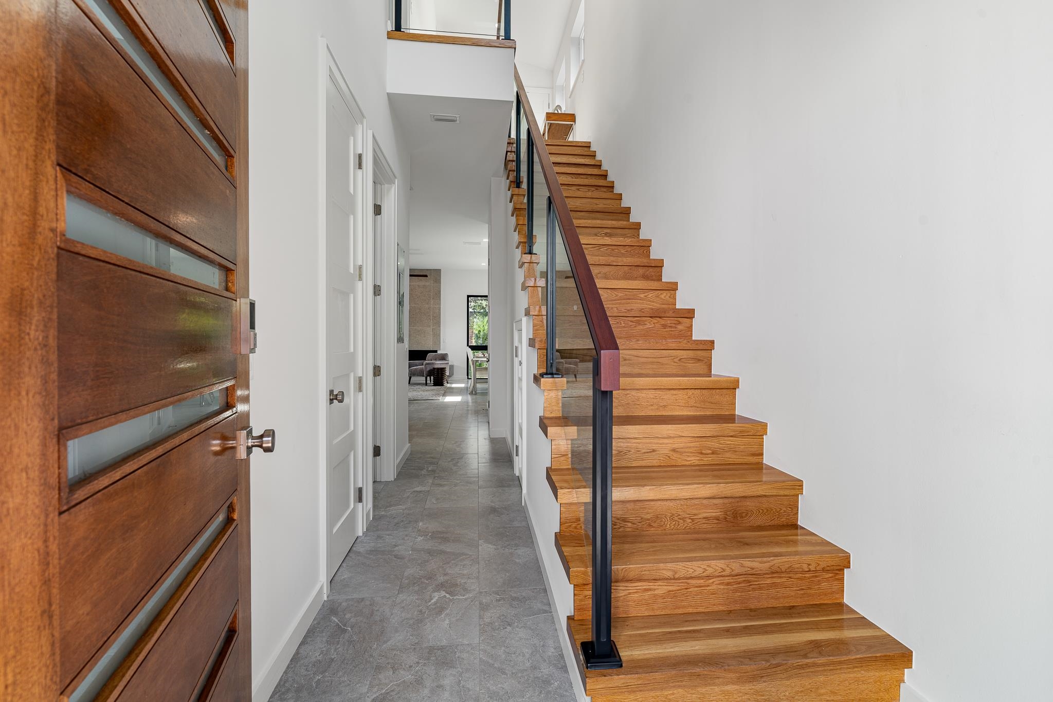327 Minorca Avenue St. Augustine, FL 32080 - Photo 6 of 74 a view of a hallway with wooden floor and entryway