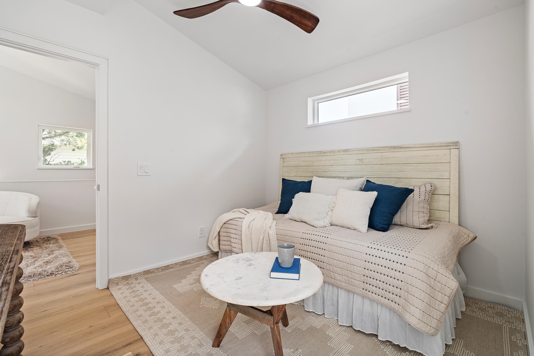 327 Minorca Avenue St. Augustine, FL 32080 - Photo 61 of 74 a bedroom with a bed and a lamp on table