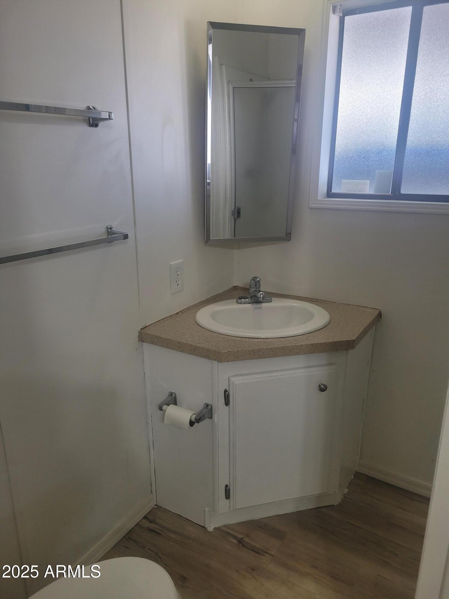834 South Meridian Road, Unit 123 Apache Junction, AZ 85120 - Photo 19 of 26 a bathroom with a sink and a mirror