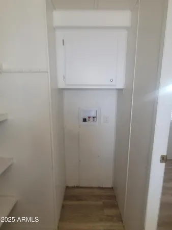 a view of a closet with shelf