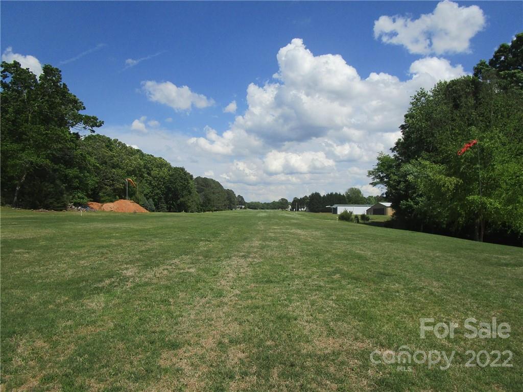 29 Aeronca Road Belton, SC 29627 - Photo 3 of 18 a view of a green field with clear sky