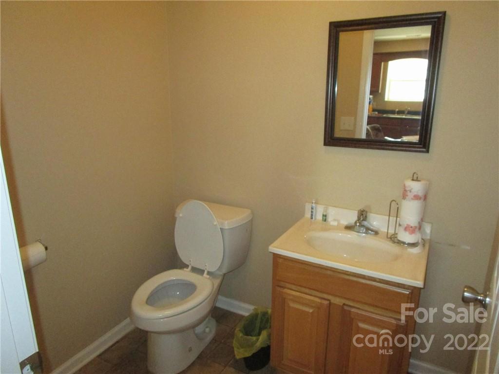 29 Aeronca Road Belton, SC 29627 - Photo 6 of 18 a bathroom with a toilet sink and mirror