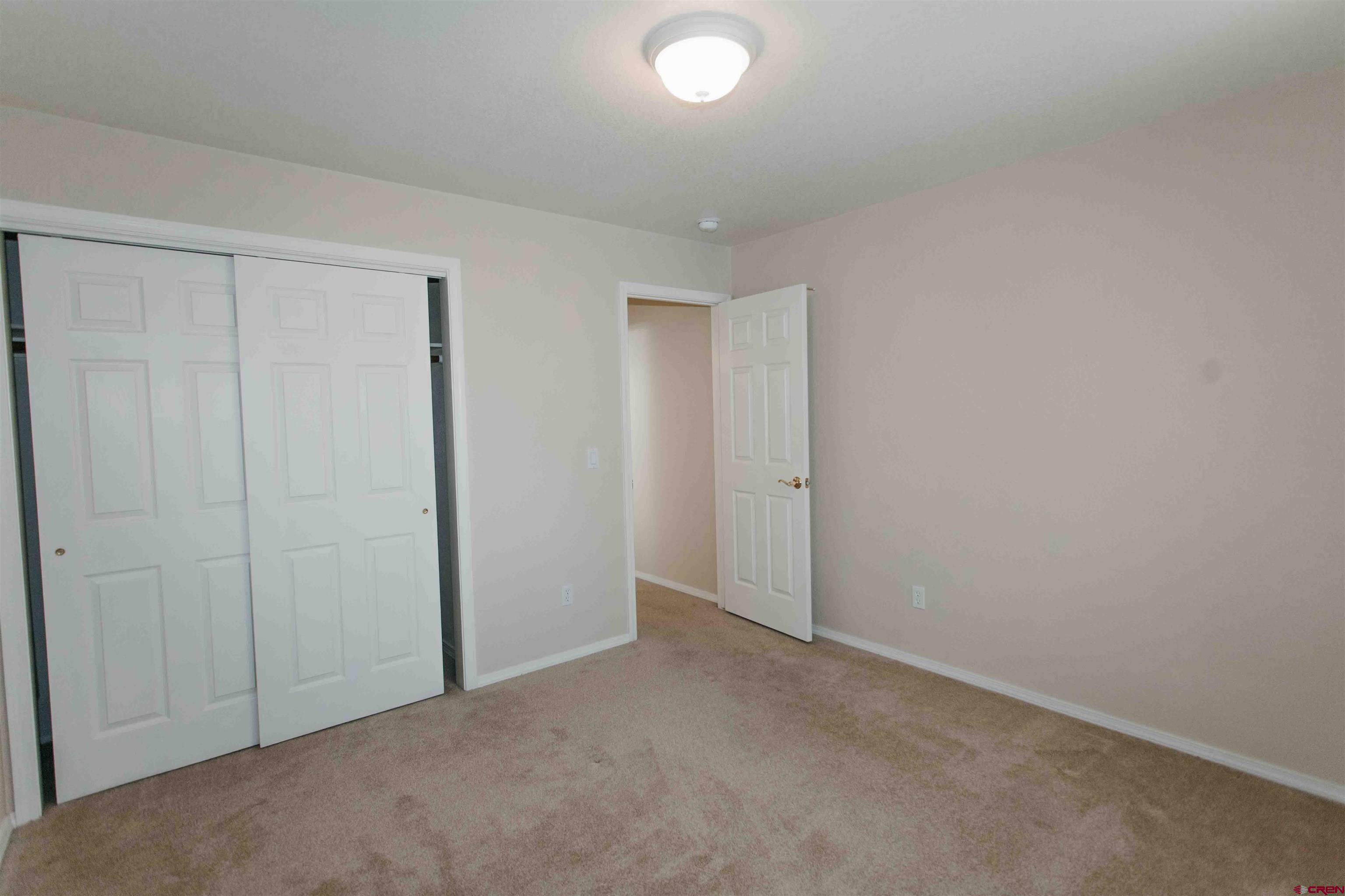 2806 Bluebell Court Montrose, CO 81401 - Photo 21 of 37 a view of an empty room