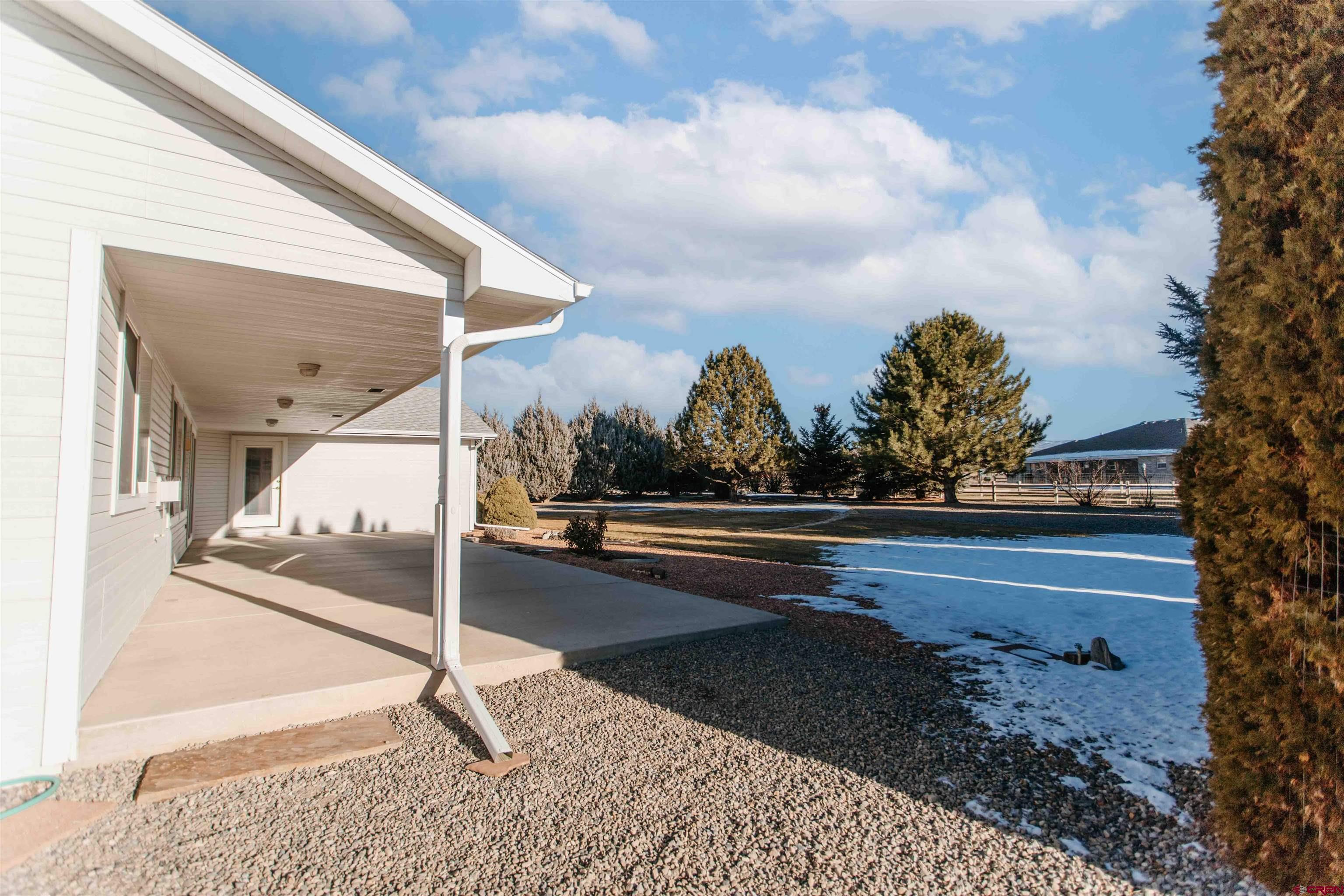 2806 Bluebell Court Montrose, CO 81401 - Photo 23 of 37 a view of swimming pool with outdoor seating