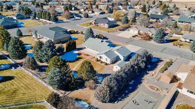 an aerial view of a houses with outdoor space